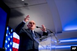 FILE - Rudy Giuliani, an attorney for President Donald Trump, speaks at the Grand Hyatt hotel, May 5, 2018, in Washington.