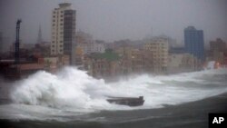 Strong waves brought by Hurricane Irma hit the Malecon seawall in Havana, Cuba, late Saturday, Sept. 9, 2017.