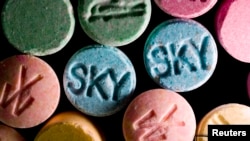 FILE - Ecstasy pills, which contain MDMA as their main chemical, are pictured in this undated handout photo courtesy of the US Drug Enforcement Administration.