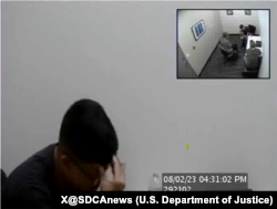 资料照片：美国检察官公布的视频截图显示魏金超被捕后接受联邦调查局面谈。(2025年8月2日)