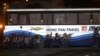 Police and SWAT members assault a tourist bus to rescue hostages at Manila's Rizal Park Monday, 23 Aug 2010