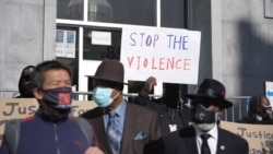Demonstrators take part in a community rally to raise awareness of anti-Asian violence and racist attitudes, outside the Hall of Justice, San Francisco, March 4, 2021.