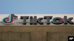 FILE - A TikTok sign is displayed on the company's building in Culver City, California, March 11, 2024.