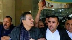 Niyaməddin Əhmədov və Əli Kərimli aksiya zamanı