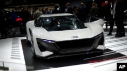 The Audi PB 18 e-tron is on display at the Auto show in Paris, France, Tuesday, Oct. 2, 2018, 2018. (AP Photo/Thibault Camus)