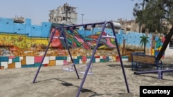 Swings are seen at a park in central Raqqa that was recently restored, nearly two years after IS was removed from the city, in Raqqa, Syria, June 25, 2019. (Courtesy photo)