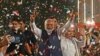 India’s Prime Minister Narendra Modi flashes victory sign as he arrives at the Bharatiya Janata Party (BJP) headquarters to celebrate the party’s win in country's general election, in New Delhi, June 4, 2024.