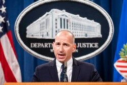 FILE - Acting U.S. Attorney Michael Sherwin speaks during a news conference in Washington, Jan. 12, 2021.