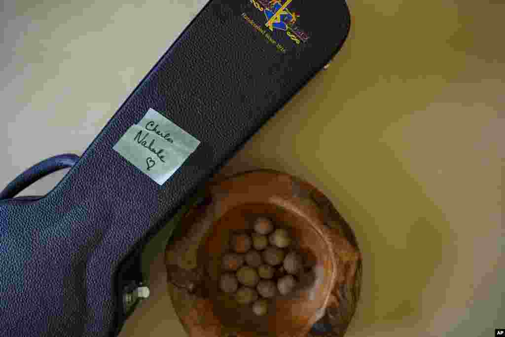 A sticky note is posted on a ukulele case gifted for Charles Nahale after he lost most of instruments from August&#39;s widlfrire on Tuesday, Oct. 10, 2023, in Lahaina, Hawaii.&nbsp;
