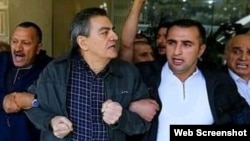 Niyaməddin Əhmədov və Əli Kərimli aksiya zamanı