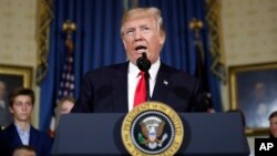 FILE - President Donald Trump speaks during an event at the White House.