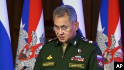 FILE - In this Thursday, Dec. 22, 2016 file photo, Russian Defence Minister Sergei Shougu speaks during a meeting with senior military officials in Moscow, Russia. Sergei Shoigu told lawmakers Wednesday, Feb. 22, 2017, that the sweeping military modernization program will continue at a high pace this year. Amid tensions with the West, the Kremlin has continued to spend big on new weapons despite Russia's economic downturn.