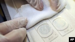 រូបេកសារ៖ ការ​ពិនិត្យ​រក​មើល​មហារីក​ដោះ និង ​ក នៅ​មណ្ឌល​សុខភាព​ NorthPoint ទីក្រុង Minneapolis រដ្ឋ Minnesota សហរដ្ឋ​អាមេរិក។