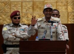 Sudanese Gen. Mohammed Hamdan Dagalo, the deputy head of the military council, speaks during a rally to support the new military council that assumed power in Sudan after the overthrow of President Omar al-Bashir, in Khartoum, Sudan, June 16, 2019.