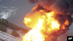 Oil refinery facility is on fire in Ichihara, Chiba Prefecture (near Tokyo) after strong earthquakes hit Japan, March 11, 2011