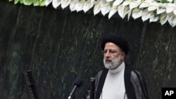 FILE - President Ebrahim Raisi speaks after taking his oath of office in Tehran, Iran, August 5, 2021. He said last week that trying to revive the Iran nuclear deal "is on the government's agenda, but not under pressure" from the West.