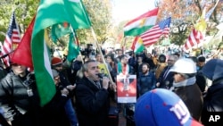 Protesters rally against the Washington visit of Turkish President Recep Tayyip Erdogan outside the White House, Nov. 13, 2019, in Washington.