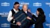 Interior Secretary Deb Haaland, right, and Bryan Newland, assistant secretary for Indian Affairs at the Department of the Interior, present President Joe Biden with an Eighth Generation blanket at the 2024 White House Tribal Nations Summit in Washington, Dec. 9, 2024.