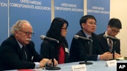 FILE - North Korean defector Jung Gwang Il, third from left, speaks to reporters at United Nations headquarters, Dec. 10, 2015, in New York, before attending a U.N. Security Council meeting on North Korea's human rights situation.