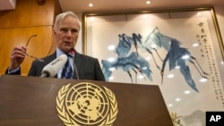 FILE - United Nations Special Rapporteur on extreme poverty and human rights, Philip Alston speaks during a news conference held in Beijing, China, Aug. 23, 2016.