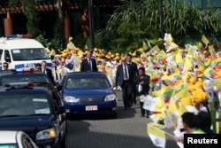 Pope Francis's convoy leaves from Yangon International Airport in Yangon, Myanmar, Nov. 27, 2017.
