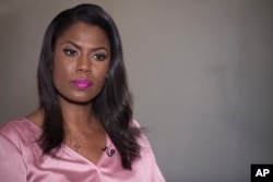 Former White House staffer Omarosa Manigault Newman listens during an interview with The Associated Press, Aug. 14, 2018, in New York.