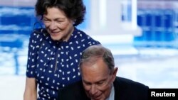 Former New York City Mayor Mike Bloomberg and his partner Diana Taylor greet the crowd after the conclusion of the ninth Democratic 2020 U.S. Presidential candidates debate at the Paris Theater in Las Vegas Nevada, U.S., February 19, 2020. 