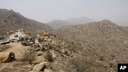 FILE - In this April 20, 2015 file photo, Saudi soldiers work at the border with Yemen in Jazan, Saudi Arabia, after Houthi rebels in Yemen blocked half of the United Nations’ aid delivery programs in the war-torn country.