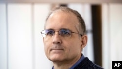 FILE - Paul Whelan, a former U.S. Marine, who was arrested in Moscow at the end of last year, waits for a hearing in a court in Moscow, Russia, May 24, 2019. 