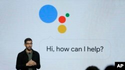 FILE - Google CEO Sundar Pichai is under the "spotlight" as he talks about Google products in San Francisco, Oct. 4, 2016. 