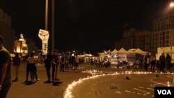Mourners mark the death of a protester, who has quickly become an icon of the nearly monthlong anti-corruption demonstrations across Lebanon, pictured in Beirut on Nov. 13, 2019. (Heather Murdock/VOA)