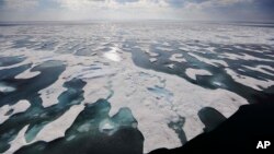 Sea ice melts on the Franklin Strait along the Northwest Passage in the Canadian Arctic Archipelago, July 22, 2017. Because of climate change, more sea ice is being lost each summer than is being replenished in winters. Less sea ice coverage also means th