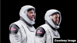 NASA astronauts Doug Hurley, left, and Robert Behnken, right, are shown in their official SpaceX space suits. (SpaceX/Flickr)