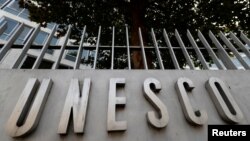 The logo of the U.N. Educational, Scientific and Cultural Organization is seen in front of its headquarters in Paris, Oct. 4, 2017.
