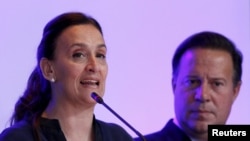 Argentina’s Vice President Gabriela Michetti addresses the audience during the opening ceremony of Expocomer International Trade Fair next to Panama's President Juan Carlos Varela at the Atlapa Convention Center in Panama City, March 9, 2016. 