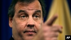 New Jersey Gov. Chris Christie gestures during a news conference Thursday, Jan. 9, 2014, at the Statehouse in Trenton, N.J. (AP Photo/Mel Evans)