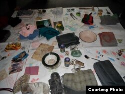 Belongings of a war victim is displayed during a Memory Box workshop in Kabul Afghanistan. (Photo: Afghanistan Human Rights and Democracy Organization)