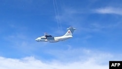 This handout photo from the Royal Malaysian Air Force taken on May 31, 2021 and released on June 1 shows a Chinese People's Liberation Army Air Force (PLAAF) Ilyushin Il-76 aircraft that Malaysian authorities said was in the airspace over Malaysia's marit