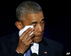 President Barack Obama wipes his tears as he speaks at McCormick Place in Chicago, giving his presidential farewell address, Jan. 10, 2017.