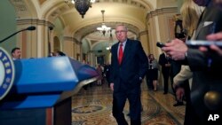 Senate Majority Leader Mitch McConnell of Kentucky, walks to the podium to speak to the media, on Capitol Hill, Sept. 19, 2017, in Washington.