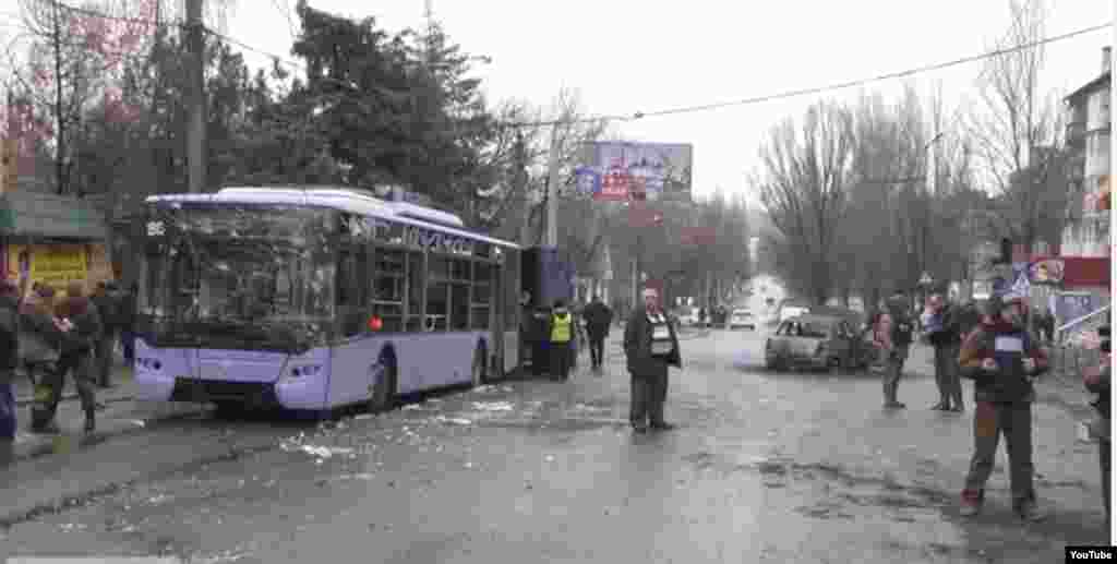 This still image captured from video footage shows a bus that was destroyed by shelling in Donetsk, Jan. 22, 2015.