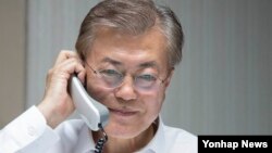 President Moon Jae-In talks over the phone with President Donald Trump.