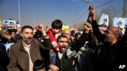 Iranian worshippers chant slogans during a rally against anti-government protestors after the Friday prayer ceremony in Tehran, Jan. 5, 2018. 