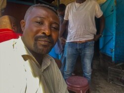 Mohammed Ahmed, a 38-year-old civil servant, says it may take a long time for Sudan to feel the impact of the lifting of the travel ban and other restrictions, in Gadarib, Sudan, Jan. 27, 2021 . (VOA/Yan Boechat)