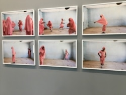 Photographs of Muslim school girls who had been abducted in 2013 by Boko Haram in Nigeria. Artist Rahima Gambo snapped them as part of an artistic project on resilience. (Lisa Bryant/VOA)