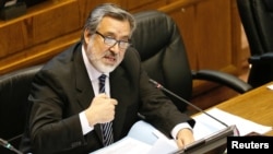 FILE - Senator Alejandro Guillier addresses the Chilean congress in Valparaiso, Chile, Jan. 10, 2017.