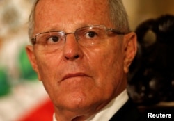 FILE - Peru's President Pedro Pablo Kuczynski attends a binational cabinet meeting at the Government Palace in Lima, Peru, July 7, 2017.