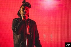 The Weeknd performs at Made in America, Sept. 6, 2015, in Philadelphia.