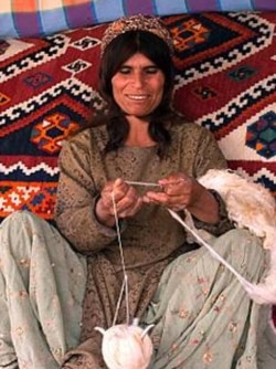 A carpet weaver in Fars, Iran