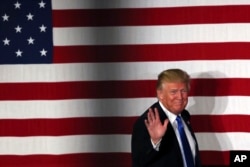 Republican presidential candidate, Donald Trump, waves during a campaign event in Lawrenceville, N.J., May 19, 2016.